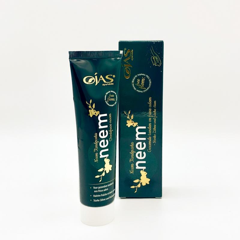 Ojas Neem toothpaste in 125g tube, showing the packaging with neem leaves and fresh mint flavor illustration.