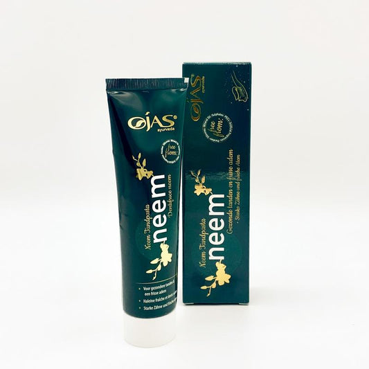 Ojas Neem toothpaste in 125g tube, showing the packaging with neem leaves and fresh mint flavor illustration.