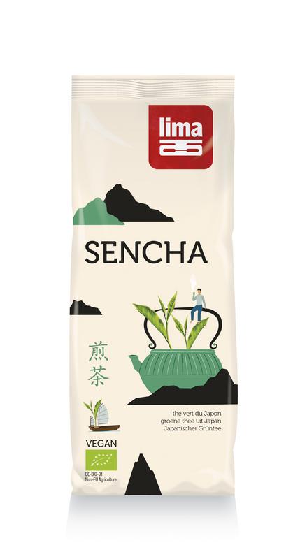 Lima Sencha groene thee bio in 75g package with fresh green tea leaves on a wooden surface.