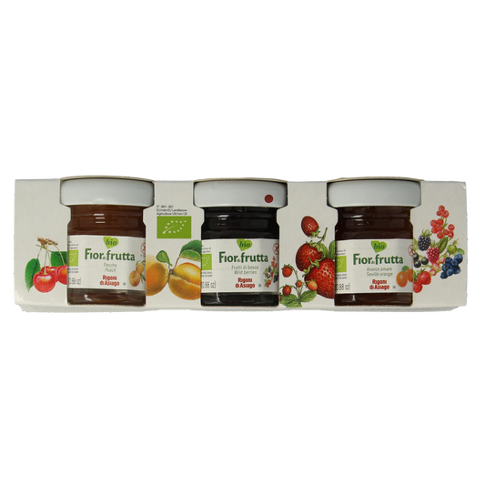 Fiordifrutta organic fruit spread on bread, 25g sample, showing vibrant fruit mixture in a clear jar.