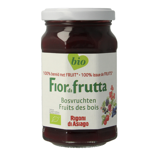 Fiordifrutta bio Bosvruchtenjam spread on bread, showing fresh mixed berry fruit jam in a jar.