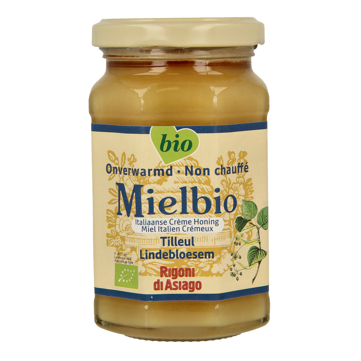Jar of Mielbio Lindebloesem organic honey cream with a golden honey color and label, placed on a wooden surface.
