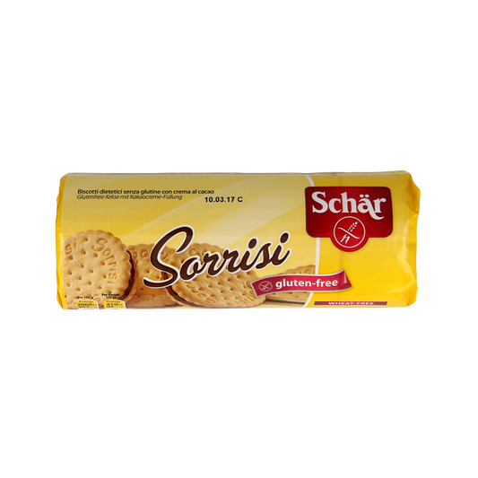Gluten-free Schar Sorrisi cookies in a 250g package, showing golden-brown koeken on a white plate.