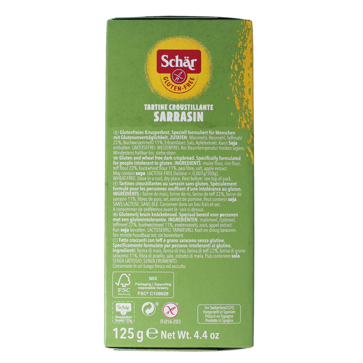 Schar gluten-free Fibre crispbread crackers stacked on a wooden surface, showcasing their golden-brown texture.