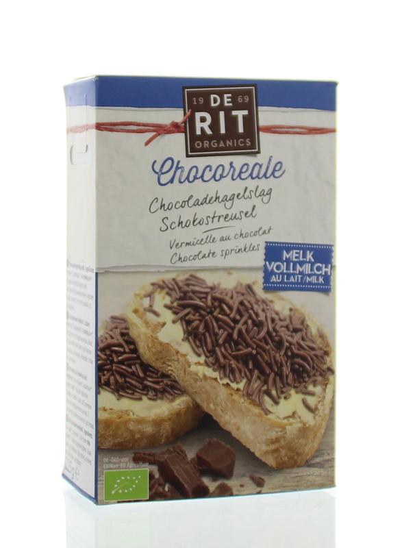 De Rit Chocoreale hagelslag melk bio spread on bread, showing chocolate sprinkles in a 225g package for breakfast or snacks.