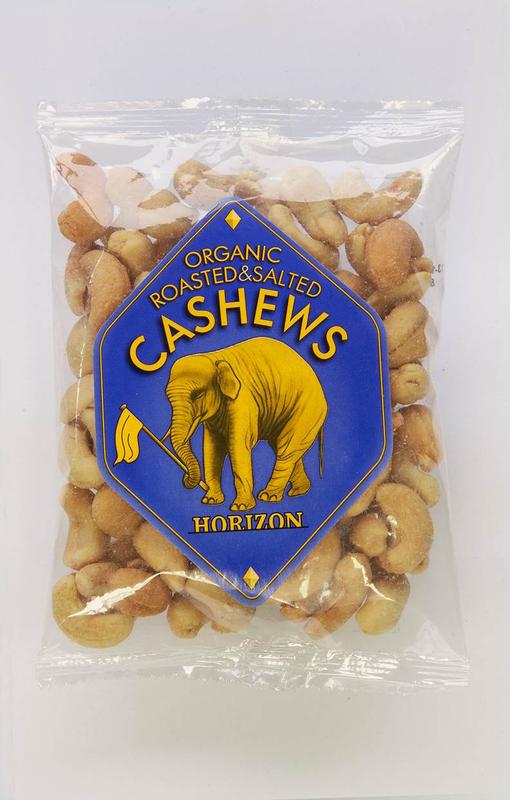 Horizon organic roasted and salted cashew nuts in a 100g package, close-up of salty, golden-brown cashew snacks.