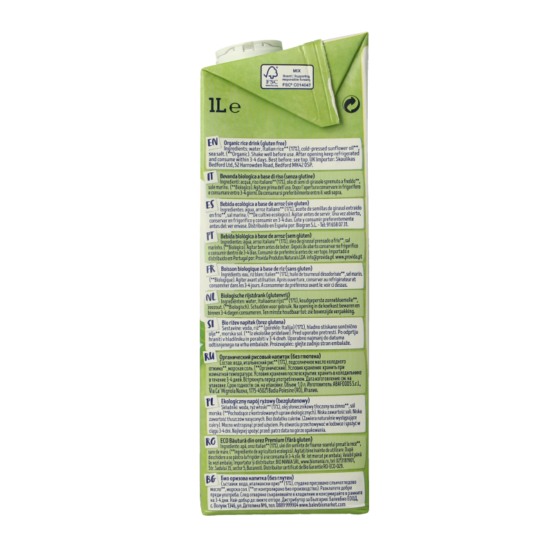 Pouring Isola Bio organic rice drink in a glass, highlighting the natural, plant-based beverage from the Isola Bio brand.