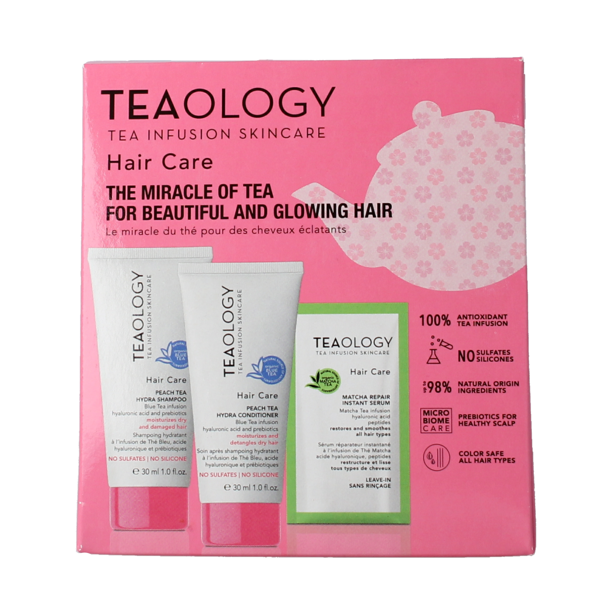 Teaology Peach tea hair care kit with shampoo and conditioner bottles, natural hair treatment for healthy, shiny hair.