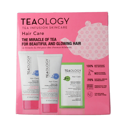 Teaology Peach tea hair care kit with shampoo and conditioner bottles, natural hair treatment for healthy, shiny hair.