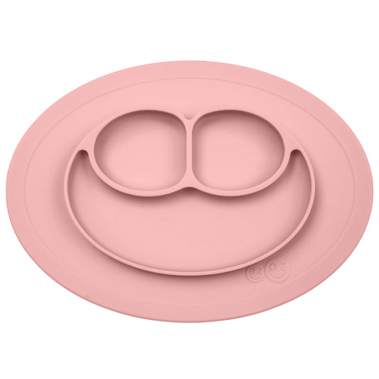 Ezpz mini blush silicone placemat for babies and toddlers, soft pink color, designed for use at home or on the go.