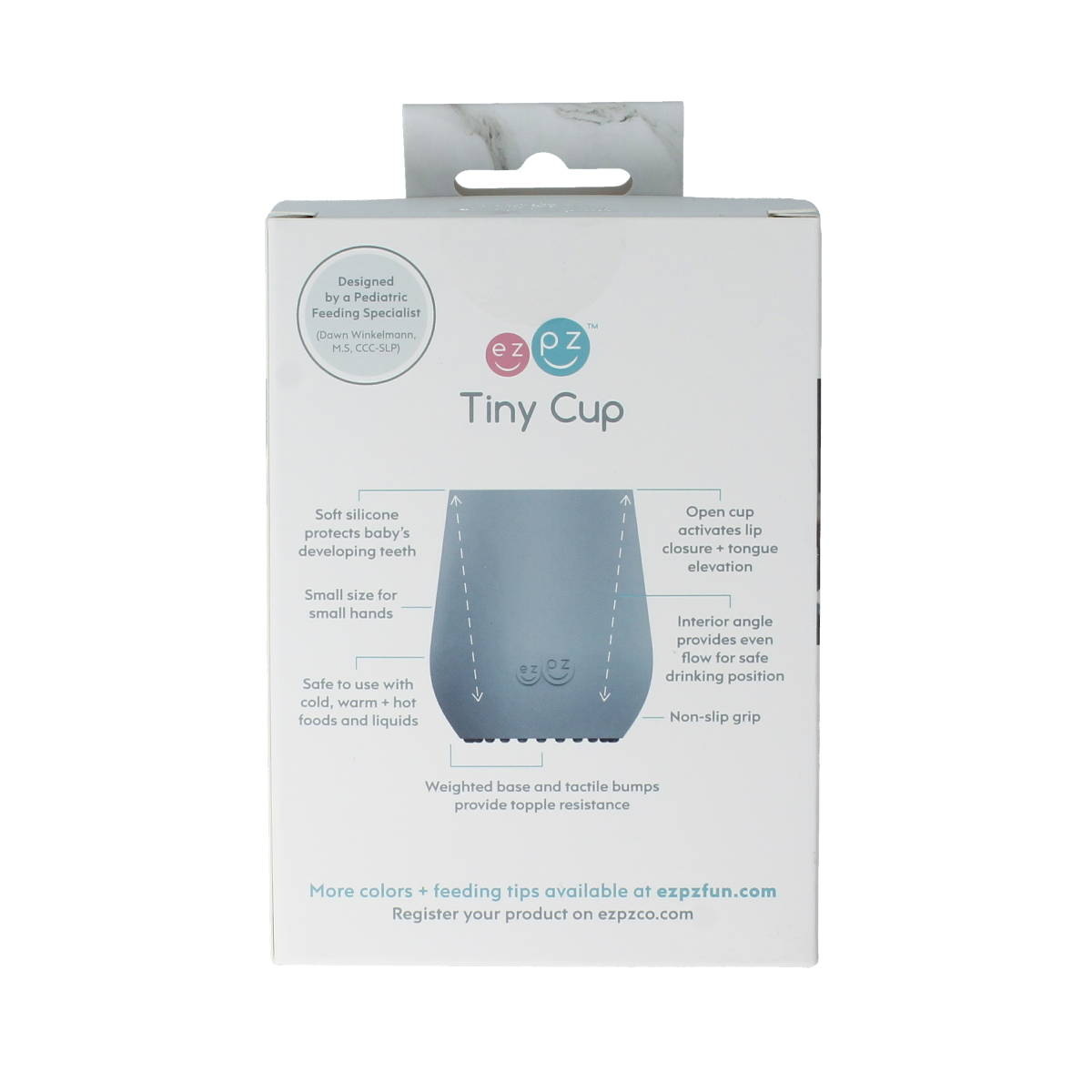 Ezpz Tiny cup in sage color, designed for babies and toddlers, displayed on a clean surface for home use.