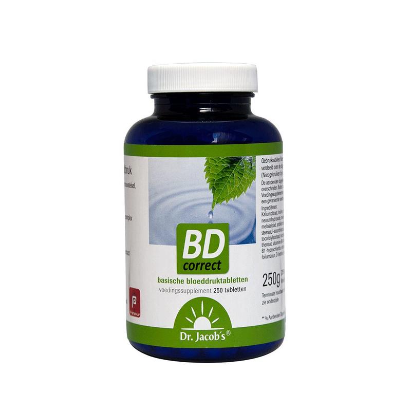 Holisan BD Correct multivitamin tablets in a white bottle, close-up of the supplement tablets with label details visible.