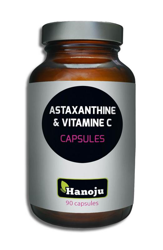 Hanoju Astaxanthine and vitamin C multivitamin capsules in a bottle, dietary supplement for skin and antioxidant support.