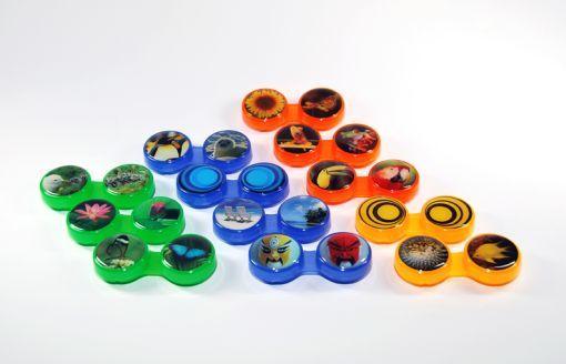 IBD Cutepak lens holder for optical use, shown with clear lens inside, compact and lightweight design for easy handling.
