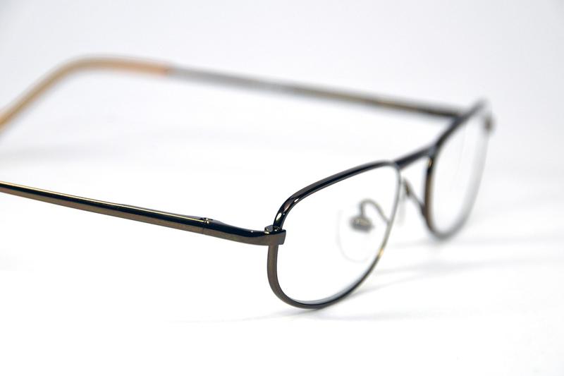 Melleson Eyewear universal reading glasses in brown with +1.00 magnification, single pair, close-up of the stylish frame.