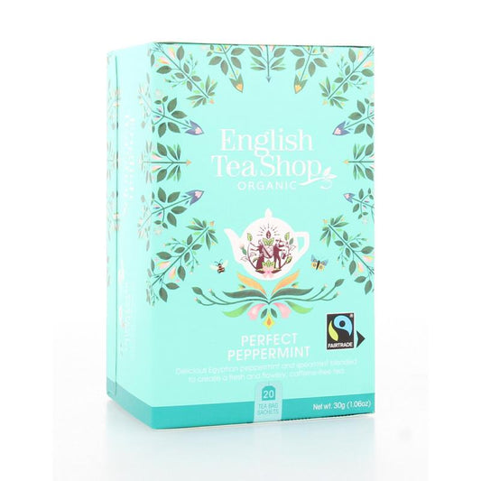 English Tea Shop Peppermint bio tea bags in a box, showcasing fresh peppermint leaves and packaging for organic herbal tea.