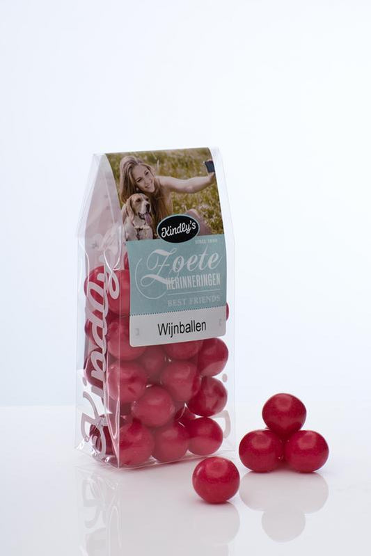 Colorful Kindly's Wijnballen snoepgoed in a 180g package, showcasing sweet wine-flavored candies with vibrant appearance.