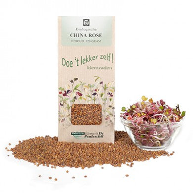 Fresh China Rose bio potatoes from Peuleschil, 120 grams, displayed in a natural setting with vibrant rose-colored skins.