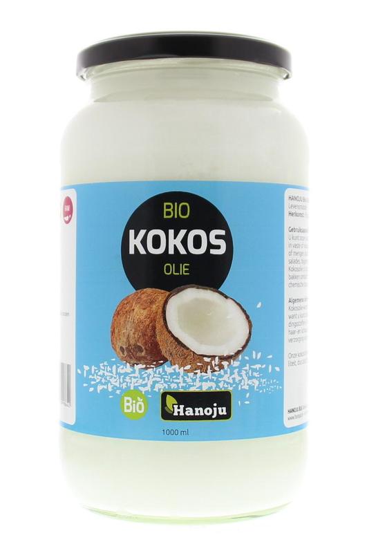 Virgin coconut oil in a glass bottle by Hanoju, 1-liter jar showing the natural, unrefined coconut oil inside.