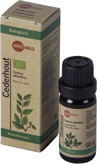Aromed bio cederhout essential oil in a 10ml amber glass bottle with a black cap, labeled with product details.