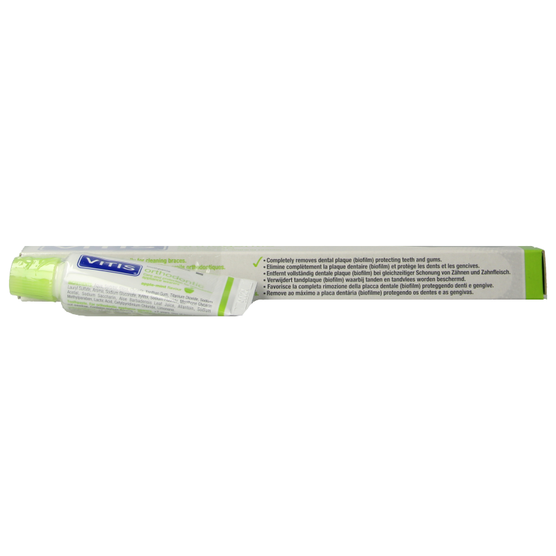 Vitis orthodontic access brush with sample toothpaste for prostheses, featuring a small brush and toothpaste set for dental care.