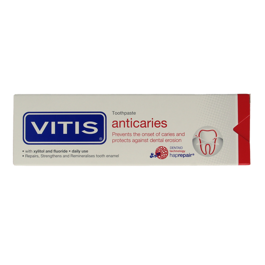 Vitis anti-caries toothpaste in 75ml tube, showing the white toothpaste with Vitis branding on the packaging.
