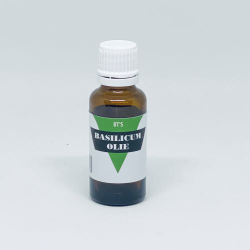 BT'S Basilicum etherische olie in 25ml bottle, natural basil essential oil with fresh green leaves and amber-colored liquid.