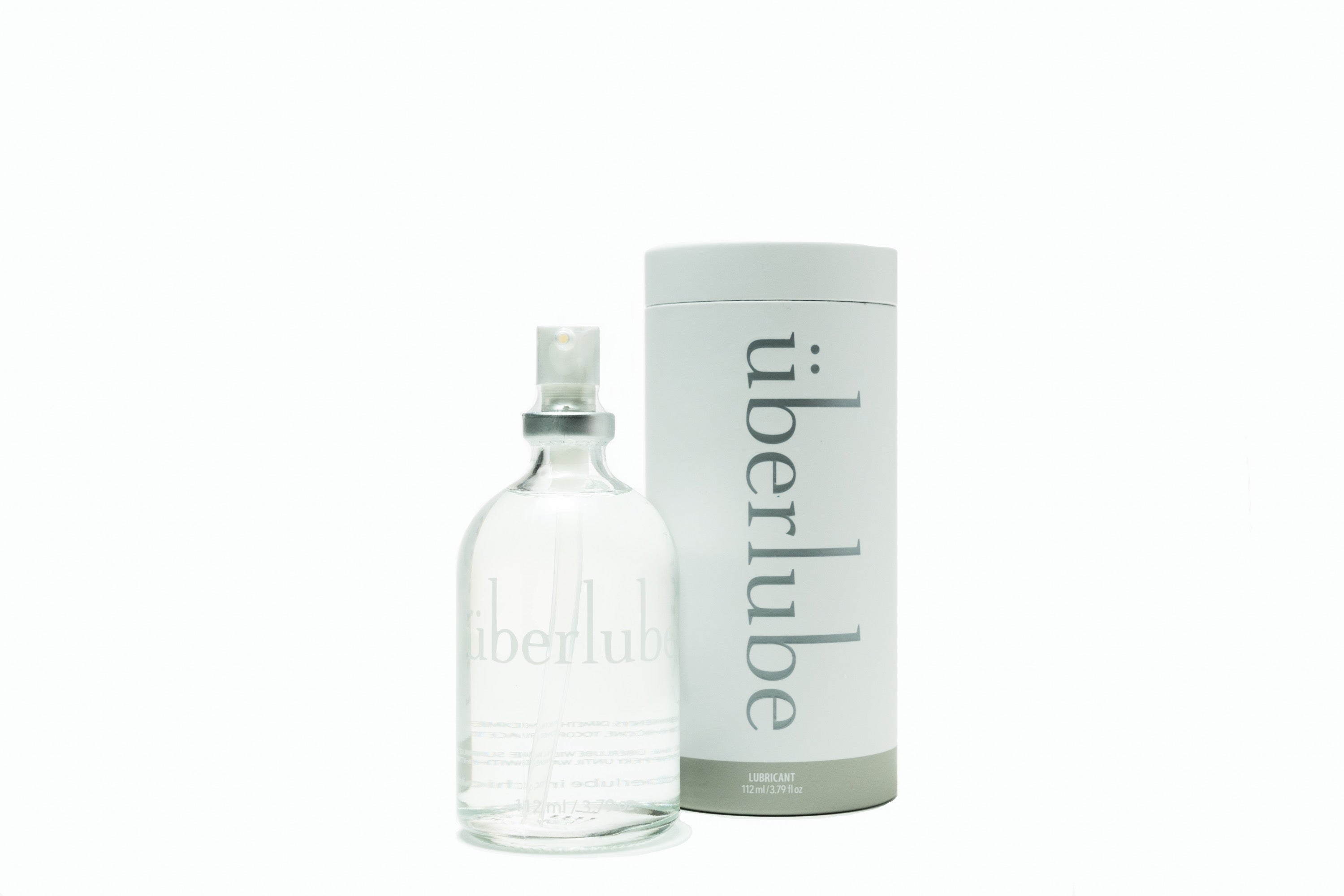 Uberlube glijmiddel in 112ml bottle, clear lubricant for intimate use, featuring sleek packaging and pump dispenser.