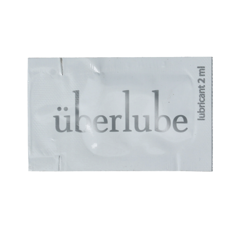Uberlube Glijmiddel sachet, 2ml, a small, transparent packet of premium lubricant from Uberlube.