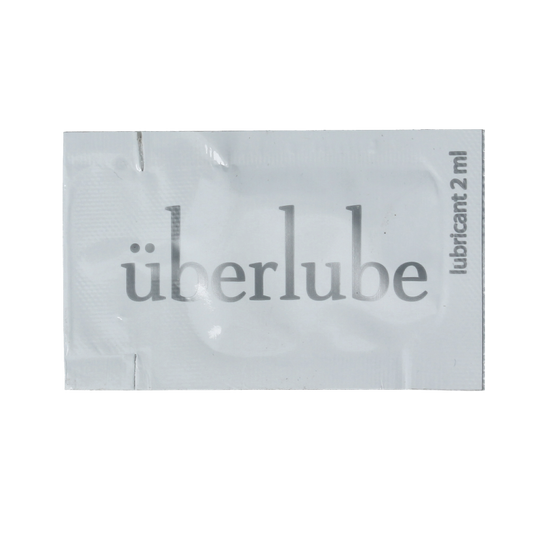 Uberlube Glijmiddel sachet, 2ml, a small, transparent packet of premium lubricant from Uberlube.