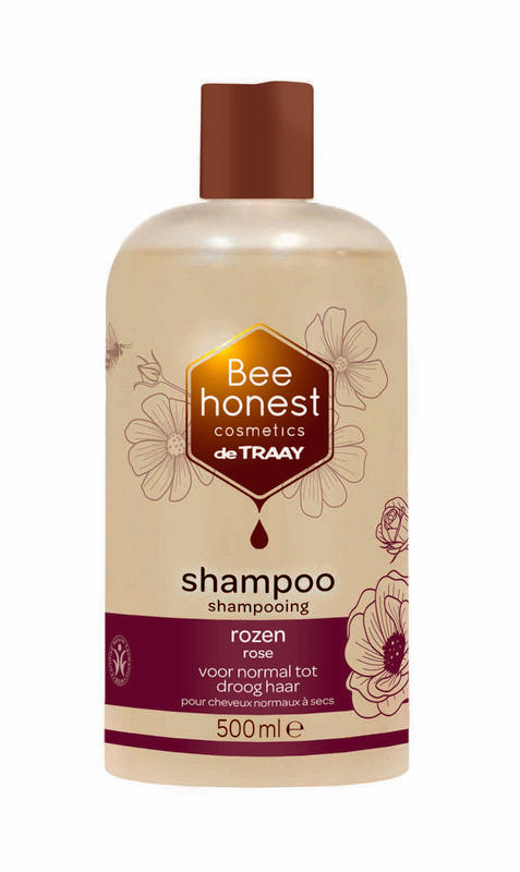 Traay Bee Honest Shampoo Rozen 500ml bottle, natural hair care product with floral scent, in a sleek bottle with a pump dispenser.