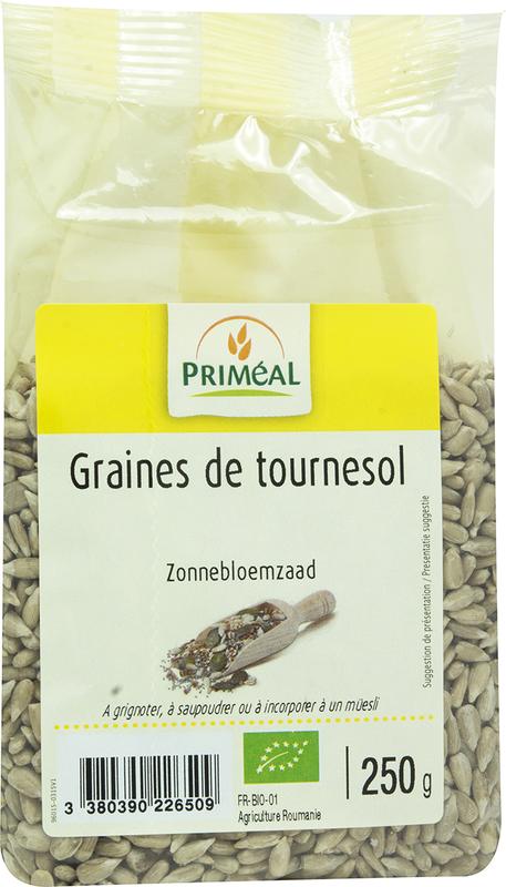 Primeal organic sunflower seeds in a 250g package, raw superfood, close-up of light brown seeds in a clear bag