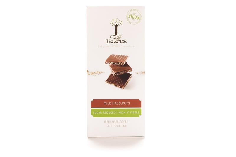 Balance Choco Stevia tablet with milk and hazelnuts, 85g, showing the chocolate tablets with hazelnut pieces and packaging.