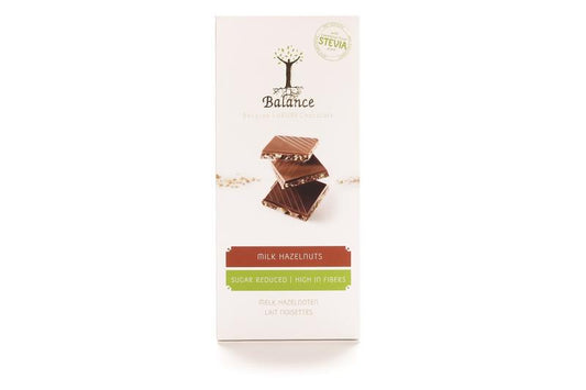 Balance Choco Stevia tablet with milk and hazelnuts, 85g, showing the chocolate tablets with hazelnut pieces and packaging.