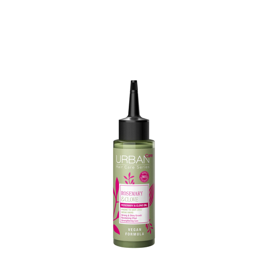 Urban Care Rosemary & Clove hair care oil in 100ml bottle, strengthening hair treatment with natural herbal ingredients.