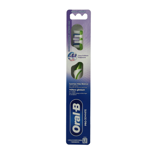 Oral B Pro 3D White manual toothbrush showing bristles and handle, designed for effective teeth cleaning and whitening.