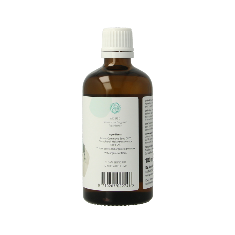 Harmonie castor olie in 100ml bottle, natural body care product with a clear label and cap, suitable for skincare routines.