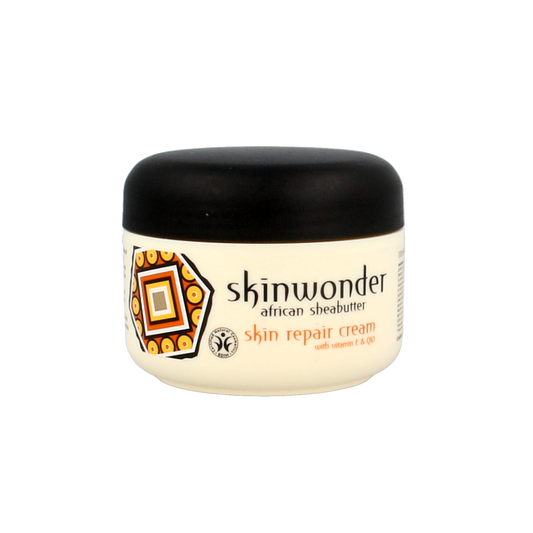 Skinwonder Skin Repair Cream 110ml, nourishing body cream in a white jar with blue lid, designed for skin hydration and repair.