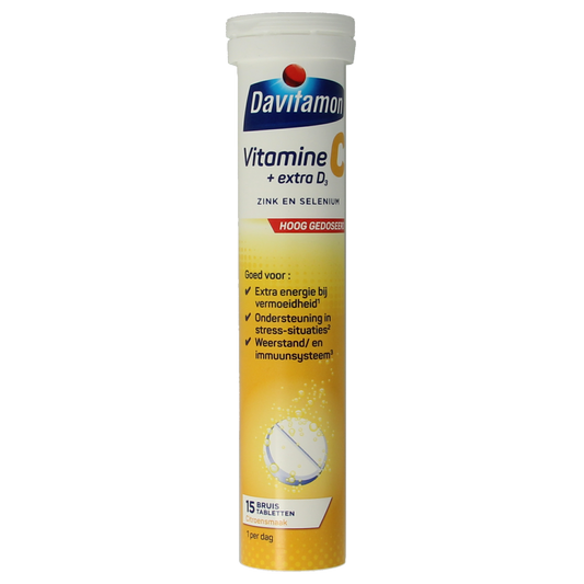 Davitamon Vitamin C & D3 effervescent tablets in a glass of water, showcasing the multi-vitamin supplement packaging.