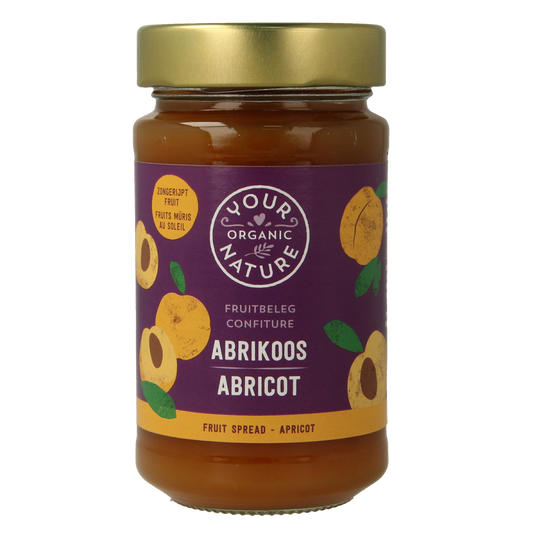 Organic apricot fruit spread from Your Organic Nature on bread, showcasing a jar of natural, bio broodbeleg.