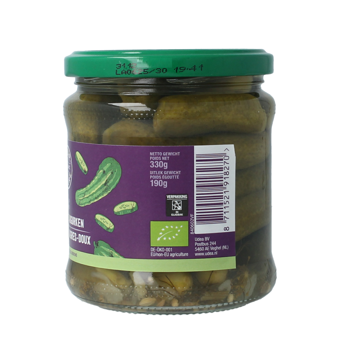 Jar of Your Organic Nature sweet and sour pickled cucumbers, 330 grams, with fresh vegetables and fruit in the background.