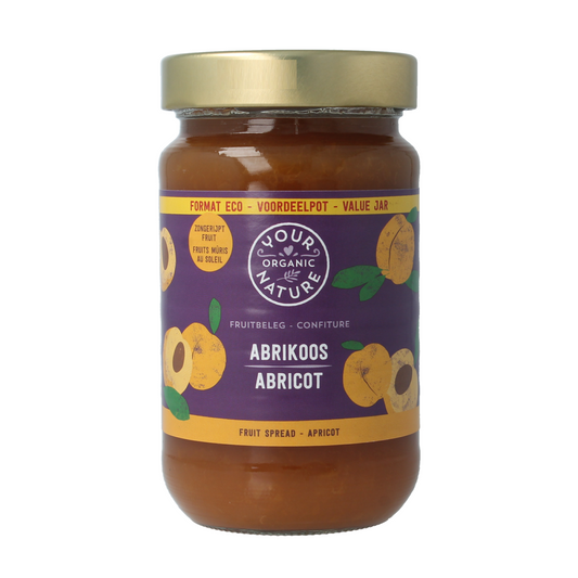 Organic apricot fruit spread from Your Organic Nature on bread, showcasing a jar of natural, bio broodbeleg.
