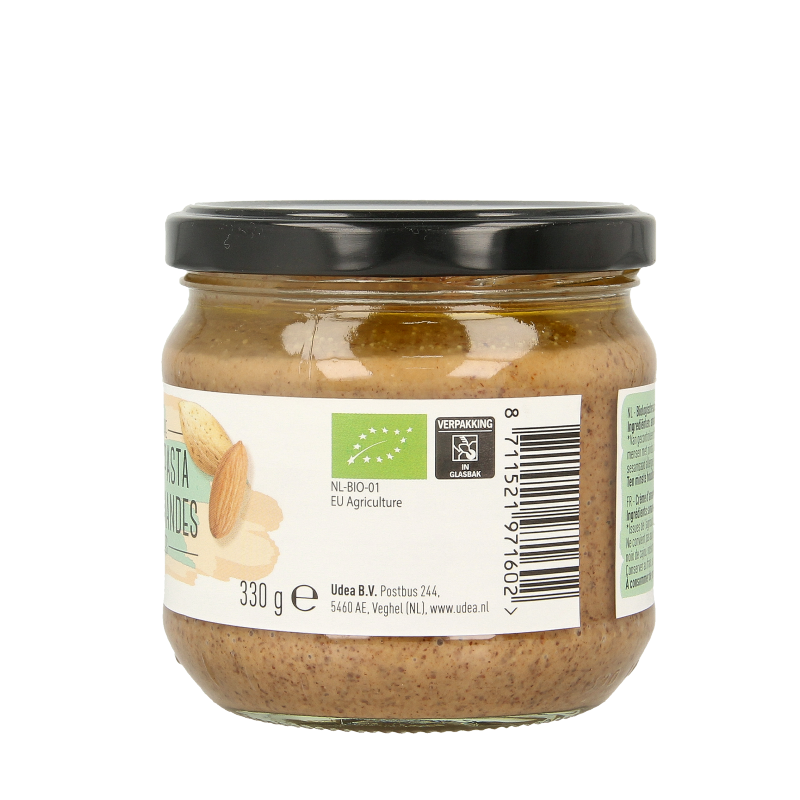Organic almond paste spread by Nice & Nuts, 330 grams, shown on bread as a natural, creamy nut-based breakfast or snack topping.
