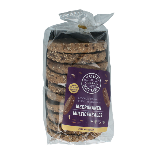 Organic Nature Beschuit meergranen bio crackers stacked on a white surface, showcasing their round shape and crispy texture.