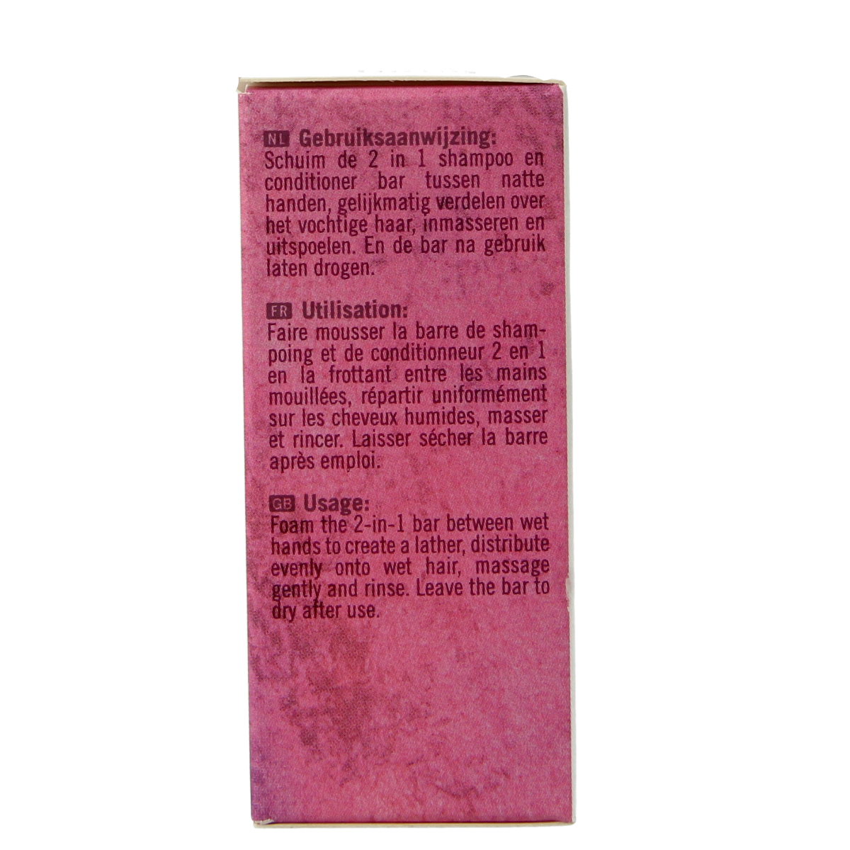 Botanique 2-in-1 shampoo and conditioner bar with fig and rose scent, 100g, natural hair care product in a sleek bar form.