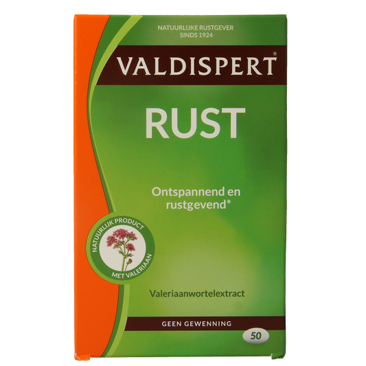 Valdispert Rust herbal supplement dragees in a clear container, showing the small, round herbal tablets inside.