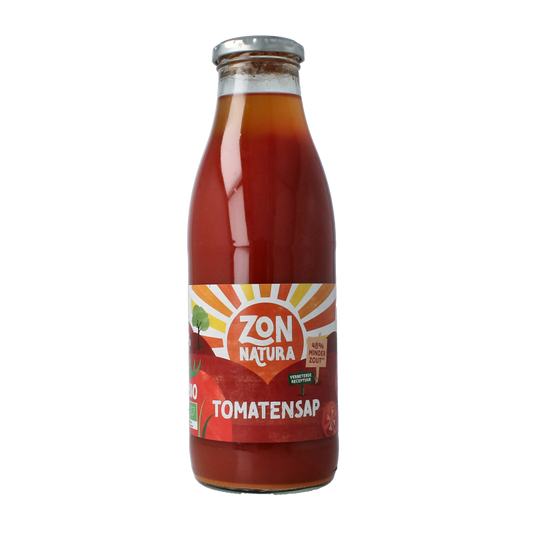 Zonnatura organic tomato juice in a 750ml bottle, natural and fresh tomato beverage in a transparent glass.