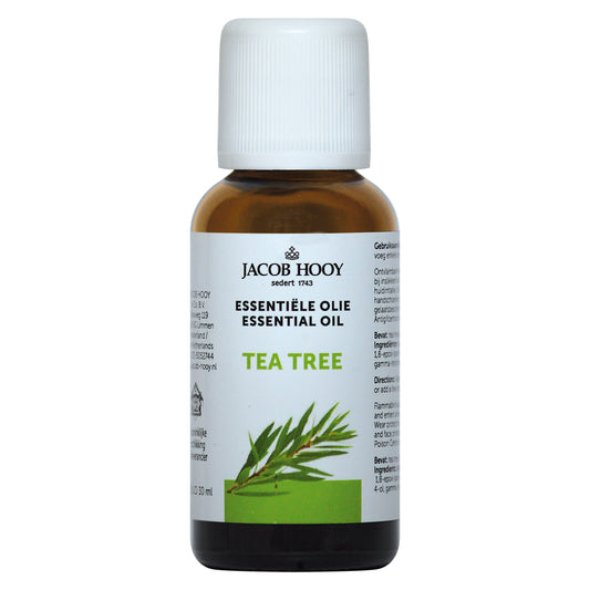 Jacob Hooy tea tree essential oil in a 30ml bottle, showing the amber glass and label with product details.