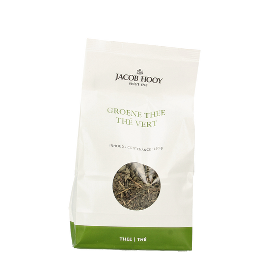 Jar of Jacob Hooy green tea with 150g label, featuring fresh green tea leaves and packaging on a neutral background.