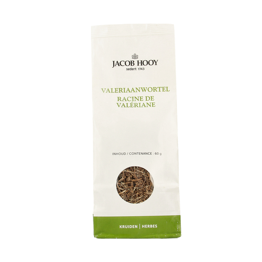 Jar of Jacob Hooy Valeriaanwortel herbal supplement, 60g, with dried valerian root visible in a clear glass jar.